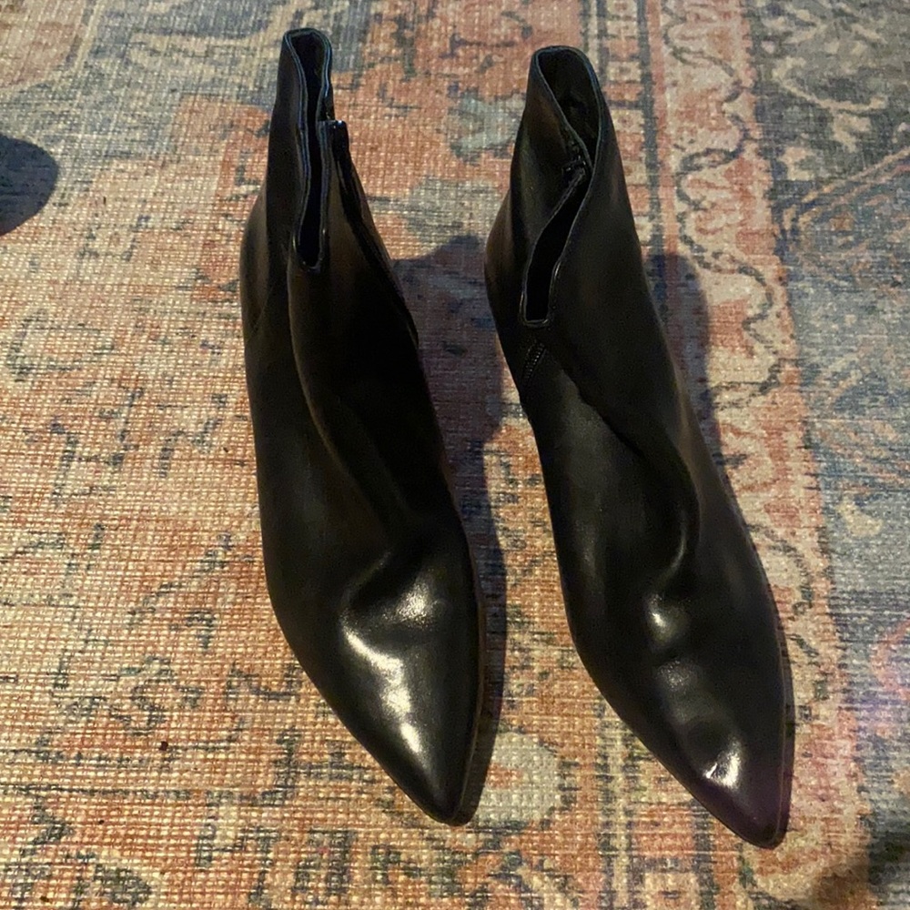 Cole Haan booties. About 1 1/2 inches heel height. In excellent condition